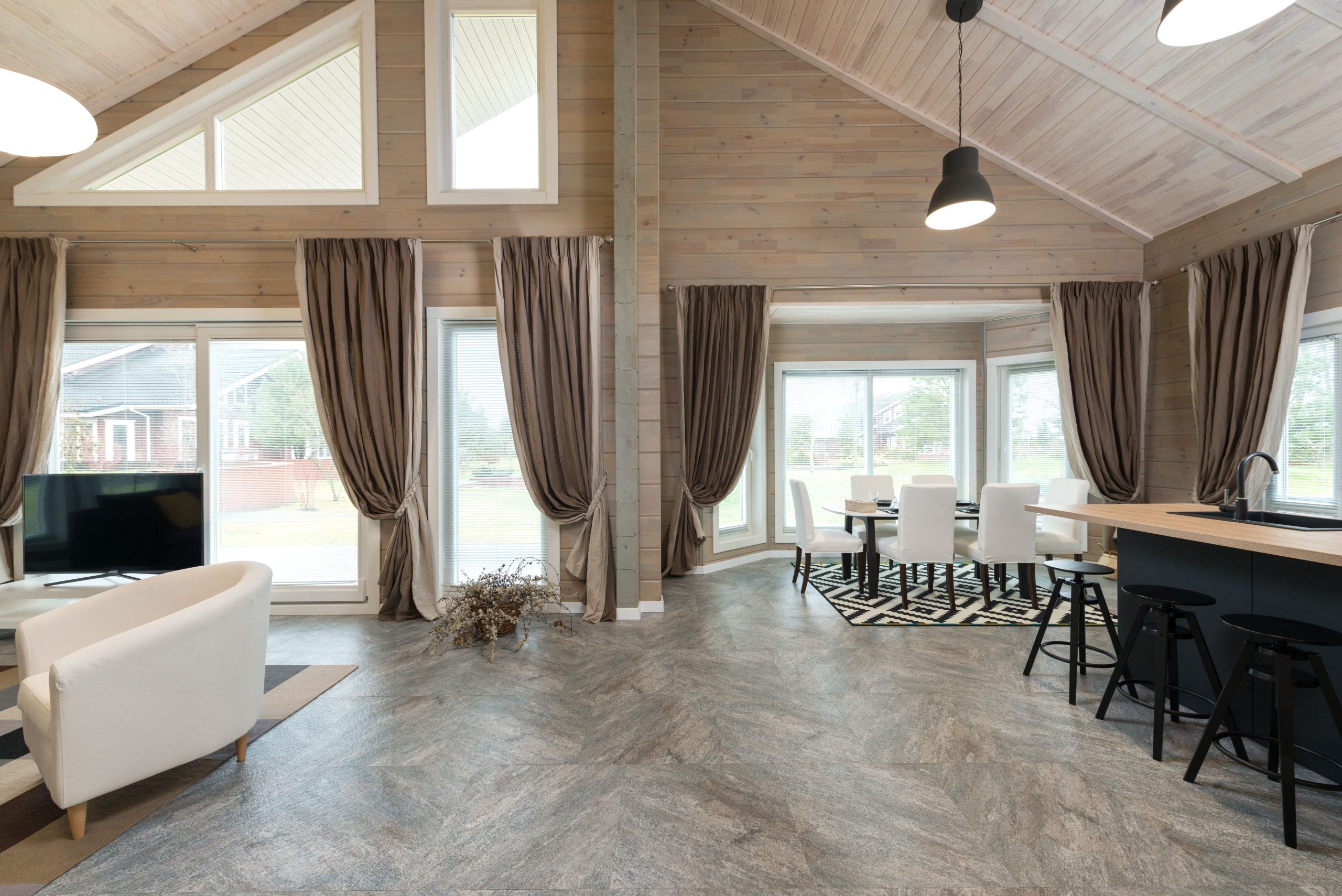 Wood-look luxury vinyl plank flooring in an open-plan Alabama living space