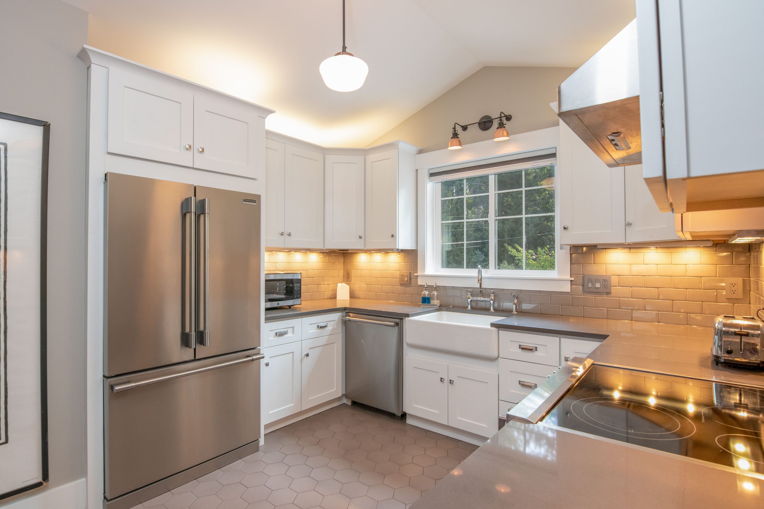 Hexagonal tile flooring in a white Alabama kitchen