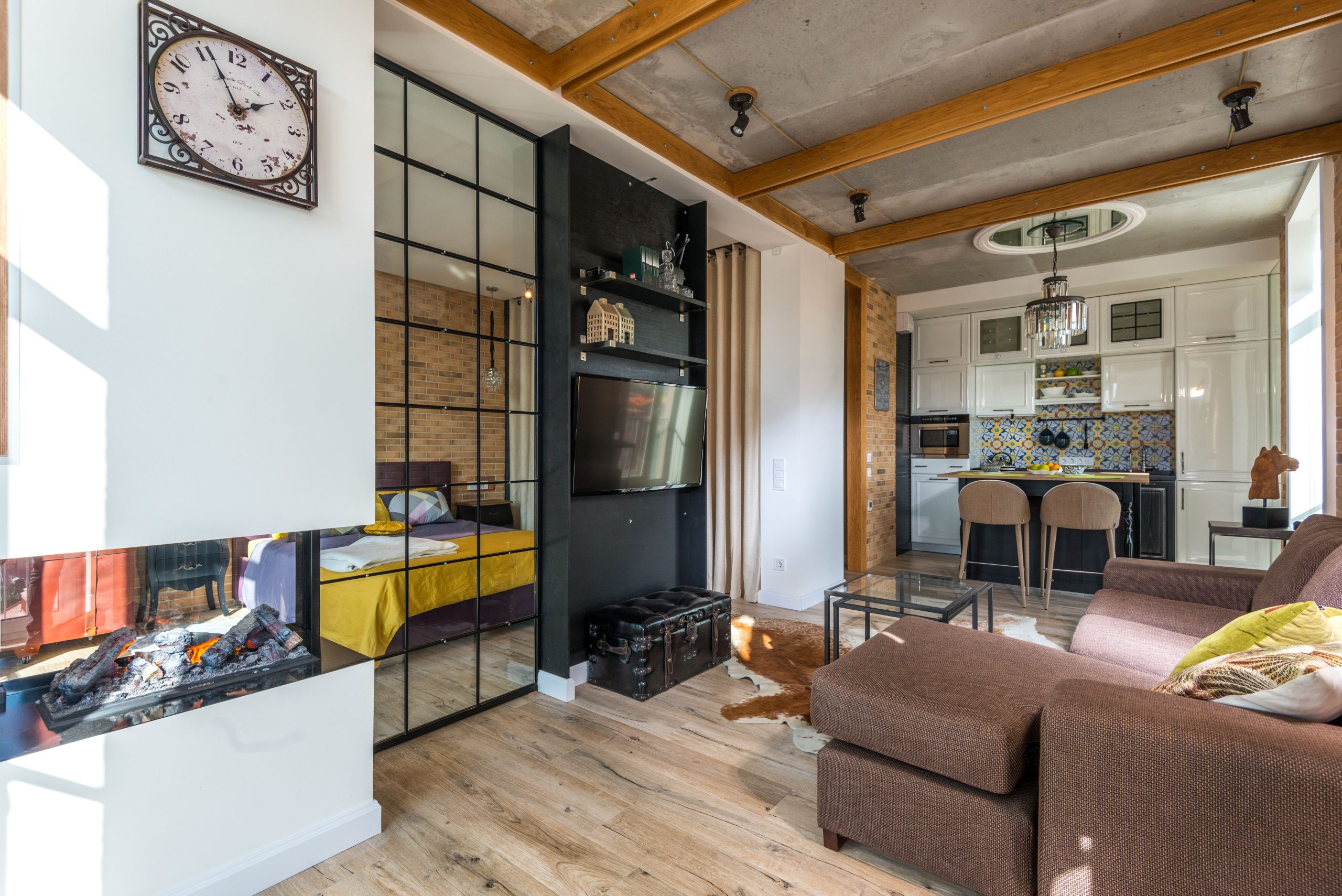 Wood flooring in an Alabama living room with a glazed partition